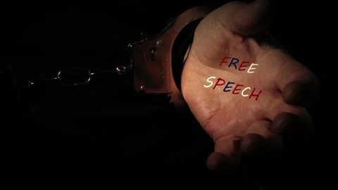 Free speech protest hands in handcuffs Stock Footage 317994045