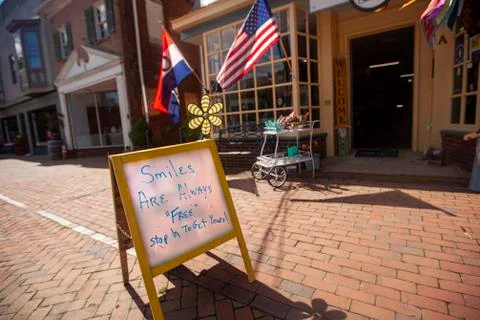 A free standing white board placed outside of a vintage shop in Chestertown, Stock Photos