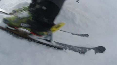 Free style skier performing a back flip on snowy mountain Stock Footage 116737892