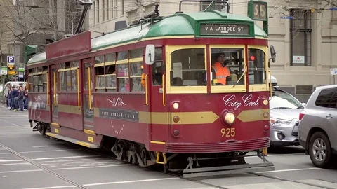 Free tourist tram Route 35 with passengers in city circle. Stock Footage