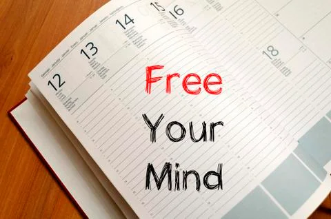 Free your mind write on notebook Stock Photos