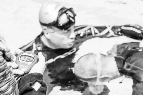 Freediver doing Static Performance with Coach a Coach Doing the Safety. Stock-Fotos