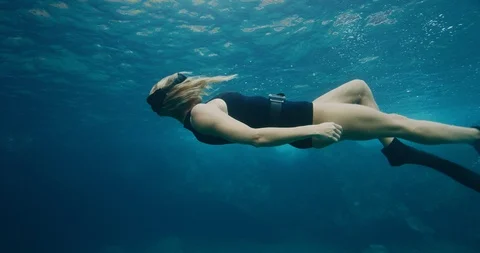 Freediving is her meditation Stock Footage 100791798