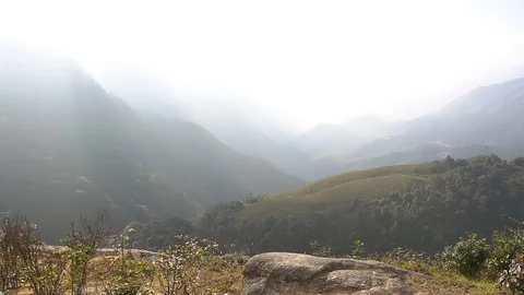 Freedom concept. Successful runner raise hands standing on mountain cliff Stock Footage 89467621