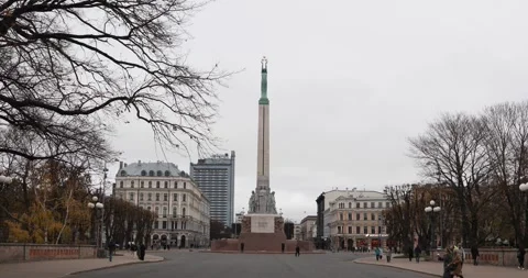 Freedom Monument in Riga framed by bare autumn trees Stock Footage 321046940