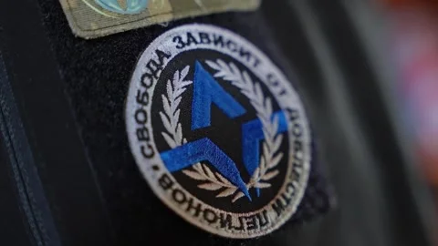 Freedom of Russia Legion patch sewn onto a uniform, symbolizing military Stock Footage 304589656