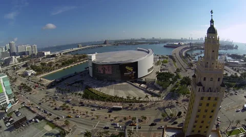 Freedom Tower aerial shot with AAA in the background, home of the Miami Heat Stock Footage