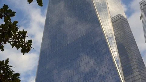 Freedom Tower, plane flying in reflection of tower Stock Footage 97884444