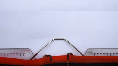 Freedom - word printed on an old typewriter in red letters, close up. Stock Footage 126644938