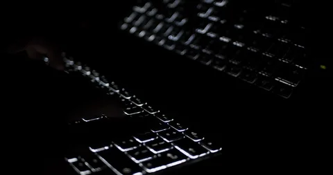 Freelance computer work from home during COVID-19 quarantine - typin on illumina 스톡 동영상 128231752