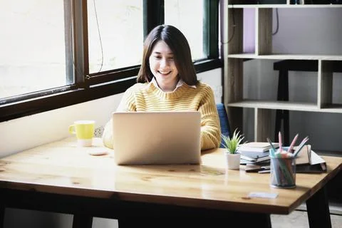 Freelance concept,female using computers to design work as ordered by customers. Stock Photos