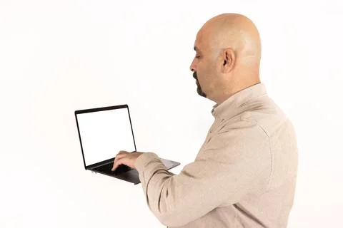 Freelance copy writer or coder holding empty blank screen laptop for mock up. Stock Photos