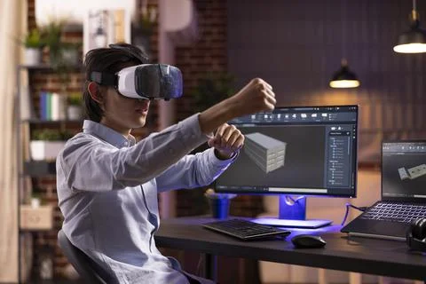 Freelance Designer Using VR and CAD Tools for 3D Project Stock Photos