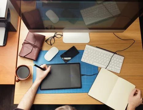 Freelance developer and designer working at home, man using desk Stock Photos