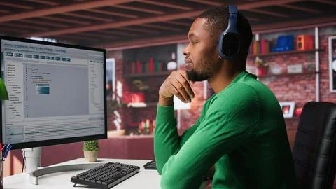 Freelance developer writing code in a modern programming language 스톡 사진