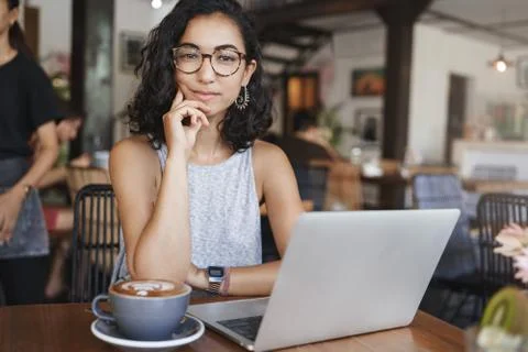 Freelance, e-learning and business concept. Attractive stylish hipster girl Stock Photos