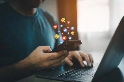 Freelance man using smart phone chating Social media. Social media and digi.. Stock Photos