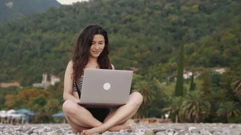 Freelance or distant working during pandemic. Pretty successful businesswoman in Stock Footage 144469975