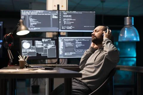 Freelance Programmer Taking Calm Break at Workstation Stock-Fotos