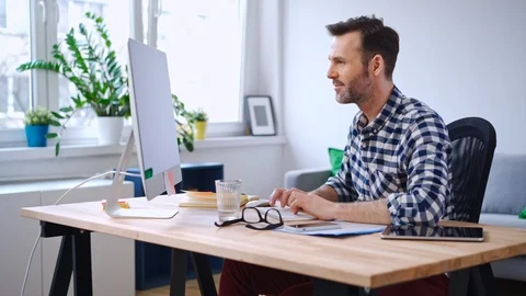 Freelance programmer working from home office Stock Footage 126830577