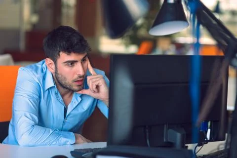 Freelance programmer working in startup office Stock Photos