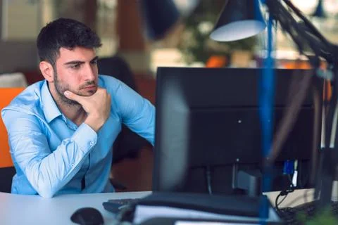 Freelance programmer working in startup office Stock Photos