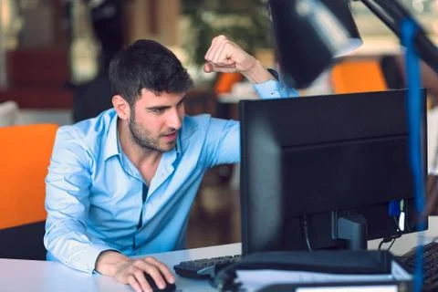 Freelance programmer working in startup office Stock Photos