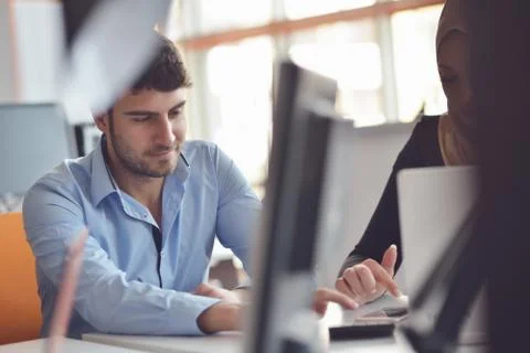 Freelance programmer working in startup office Фото