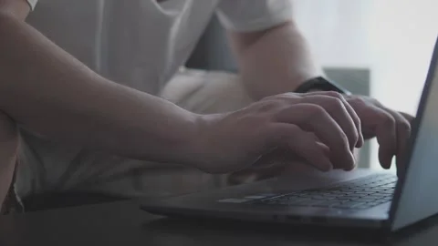 Freelance programmer works on a laptop from home Stock-Footage 306180370