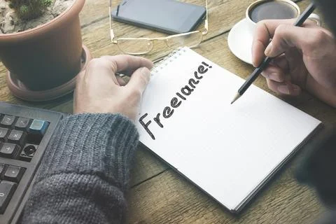 Freelance  text on notebook Stock Photos
