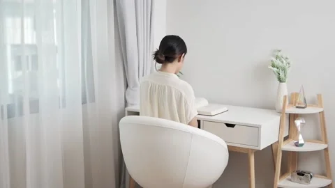 Freelance translators read articles during self-quarantine. work for personal gr Stock Footage 196849141