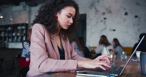 Freelance work concept. Beautiful successful mixed race business woman with Video stock 152489958