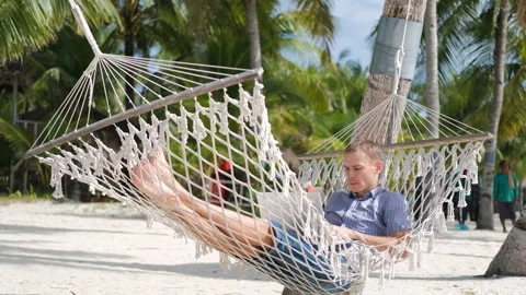 Freelance work with fruit shake on tropical beach Video stock 312381750