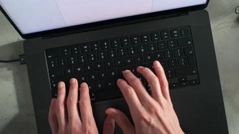 Freelance Worker Inputting Text into a Word Processor Program in Slow Motion Stock Footage 286239910