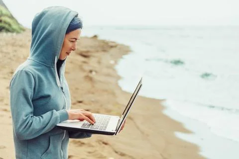 Freelance working on beach Stock Photos