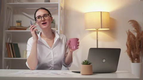 Freelancer break relax work employee coffee phone Stock Footage 180438606