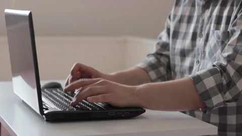 Freelancer caucasian man is using notebook in house. Stock Footage 131334369
