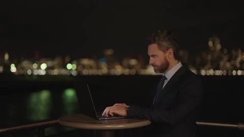 Freelancer developer typing program code outdoor. Businessman. Hispanic business Stock Footage 289163201