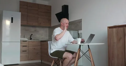 Freelancer discusses work via video chat, says goodbye and turns off the laptop Video stock 302901453