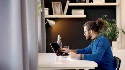 Freelancer drawing while sitting in the home office. Stock Footage 141375339