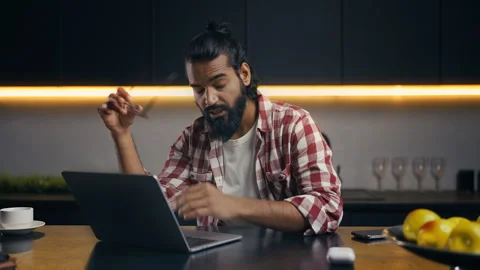 Freelancer feeling eye strain while working late on laptop, project deadline Stock Footage 313281871