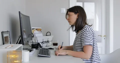 Freelancer female retouch working on computer with photo editing software Stock Footage 127387223