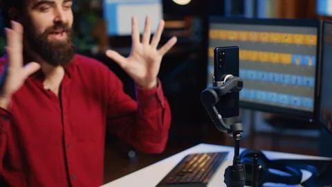 Freelancer filming tutorial on how to use graphic tablet, close up 库存照片