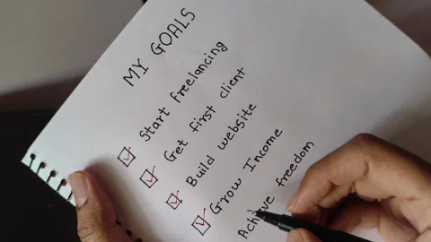 Freelancer Goals Checklist in Notebook Achieve Freedom Concept. Stock Footage 329631887