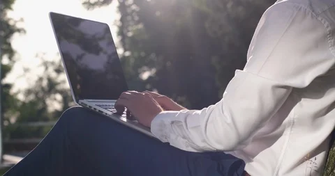 The freelancer guy is typing of the text on laptop 動画素材 126009140