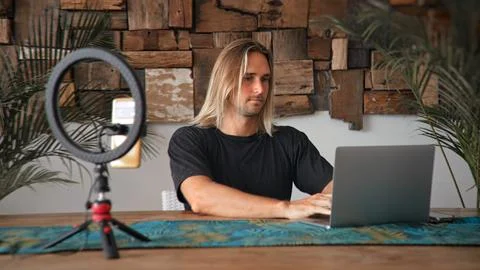 Freelancer guy work remote at home usa. Man typing computer. Online office job. Stock Photos