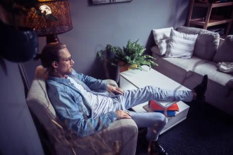 Freelancer at home having break from work. Stock Photos