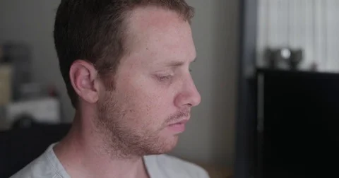 Freelancer looking at computer in home office Stock Footage 78037108