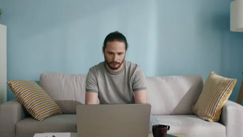 Freelancer Man Works at the Computer Stock Footage 135372549