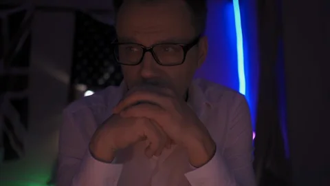 Freelancer in a neon lights working late. Stock Footage 130056845